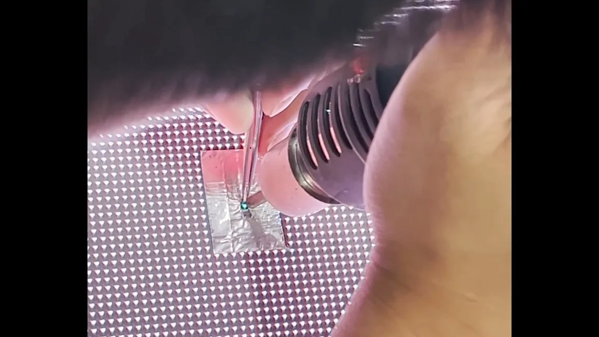 Localized hot-air and tweezer work in the GOB LED module repair demonstration