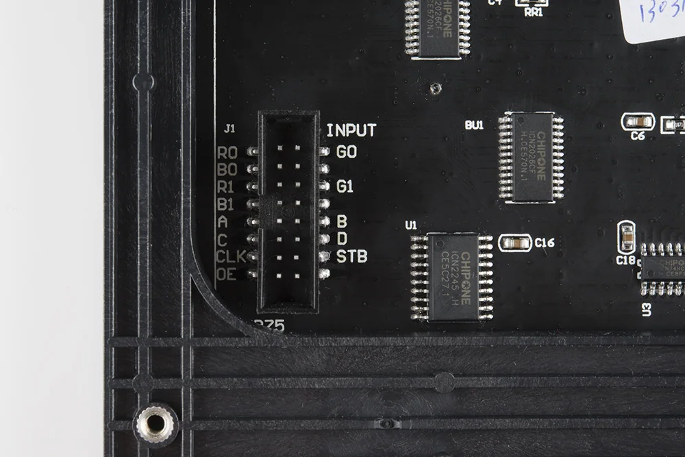 Real LED matrix PCB showing CHIPONE driver chips and labeled RGB clock latch and output-enable input pins