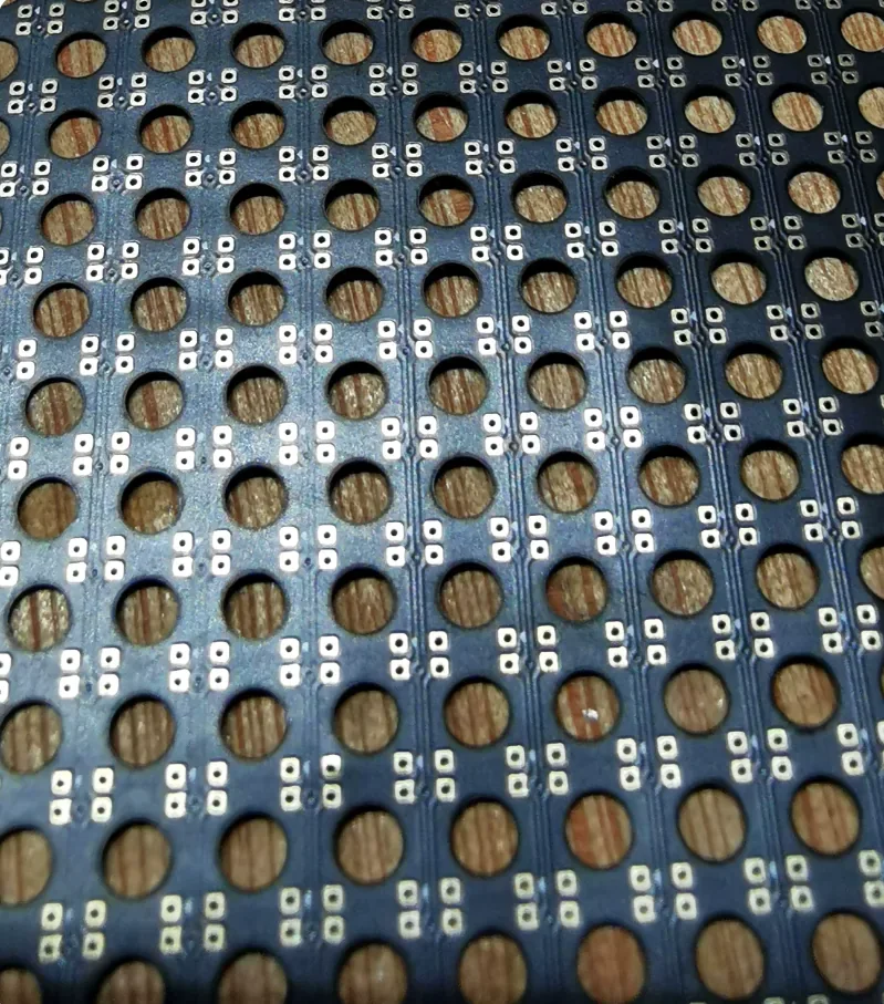 Close-up of copper pad shapes on an LED module pad-repair sheet